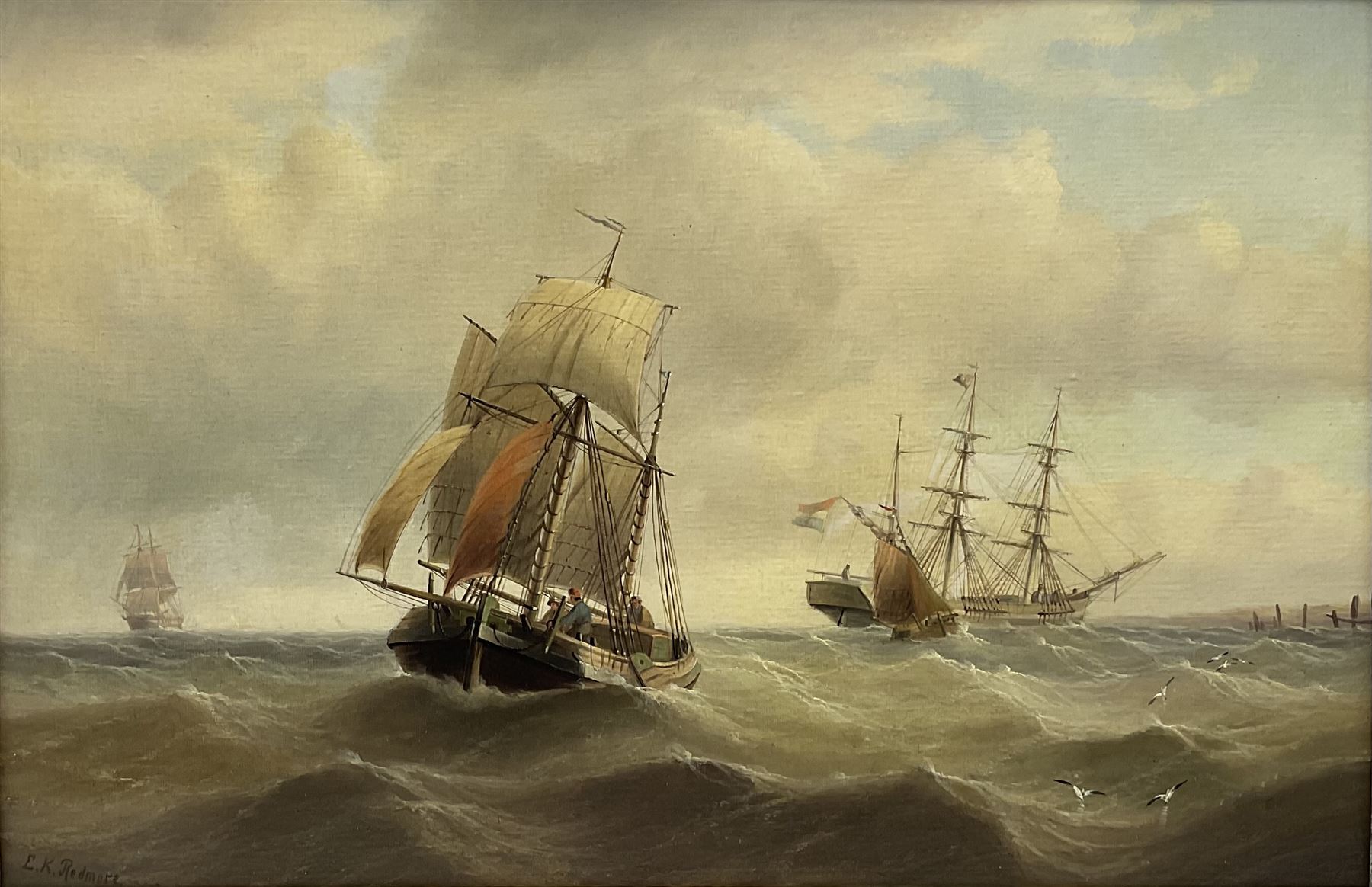 Edward King Redmore (British 1860-1941): Sailing Vessels off the Coast, oil on canvas signed 49cm x 74cm