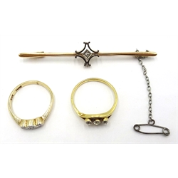  Gold three stone diamond ring (tested 18ct), gold diamond set brooch (tested 14ct) and gold ring stamped 9ct  