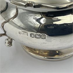 1920s five-piece silver tea service, comprising teapot, coffee pot, hot water pot, twin handled open sucrier and milk jug, each of squat circular form with shaped rim, the teapot, coffee pot and hot water pot each with ebonised handle and finial, the sucrier and milk jug with acanthus capped scroll handles, all upon circular foot, hallmarked R F Mosley & Co, Sheffield 1926 & 1927, tallest H24cm