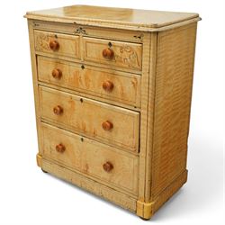 19th century pine painted chest of drawers, rectangular moulded top above two short and three graduated long drawers, each with painted foliate scroll and line detailing, turned knobs, and concealed turned feet, the sides with rounded corners and ebonised detail