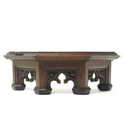 Mouseman - circa 1930s oak wedge shaped six sided plinth, of gothic design with carved berries and columnar supports, with carved mouse signature, by Robert Thompson of Kilburn