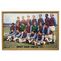 1970-1 photograph of West Ham United FC squad members, including Bobby Moore, Geoff Hurst, Harry Redknapp, Trevor Brooking, Jimmy Greaves, Billy Bonds etc, most players with signatures, 30 x 45cm, framed and glazed