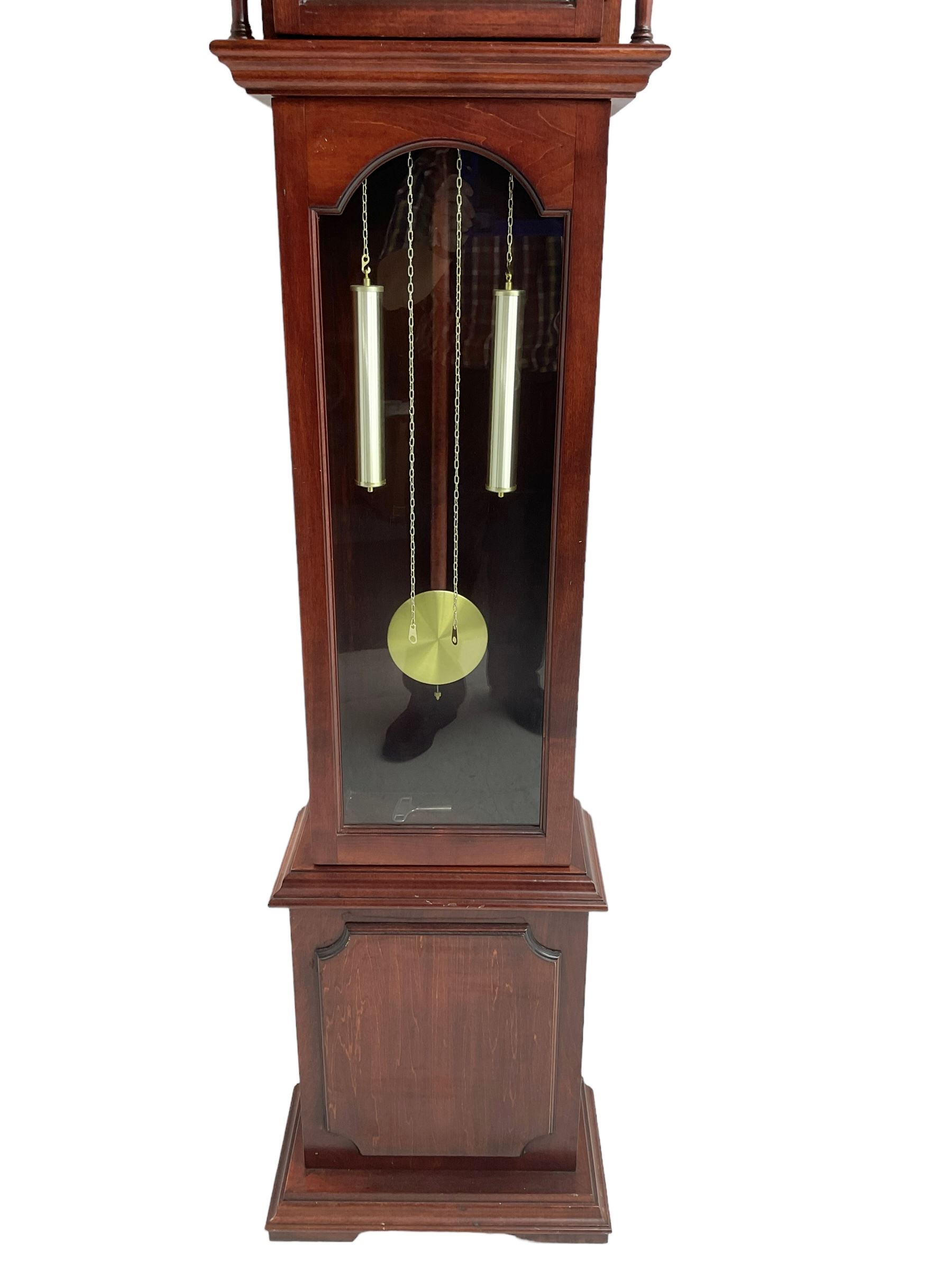 Late 20th century - Mahogany cased spring driven longcase clock, with an etched brass and silvered dial and pierced steel hands, fully glazed trunk door with visible pendulum and dummy weights, striking the hours and half hours on a gong.