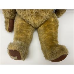Large post-war Chad Valley plush covered teddy bear with revolving head, applied eyes, vertically stitched nose and mouth, jointed limbs and growler mechanism; stitched label to right foot and Hygenic Toys label to right side H73cm