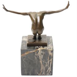 After Miguel Fernando Lopez (Portugese Contemporary):  Power of Silence, bronze modelled as a athlete crouched with arms outstretched, signed Milo, upon two tone marble plinth, overall H15cm