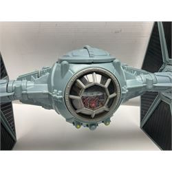 Star Wars - four space/land vehicles comprising Millenium Falcon with hinged top and figures; TIE Fighter; X-Wing Fighter with pilot; and AT-ST 'Chicken Walker' transporter; all unboxed (4)