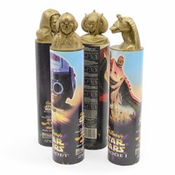 1990s Kinnerton Confectionary sealed Star Wars Advent Calendar, four Cadburys Star Wars Episode I chocolate tubes with figural lids, including Queen Amidala, Darth Maul, Anakin Skywalker and Jar Jar Binks, Topps Star Wars candy containers and 10 collectors cards and two Wilton Star Wars cake tins, C-3P0 and Darth Vader with inserts