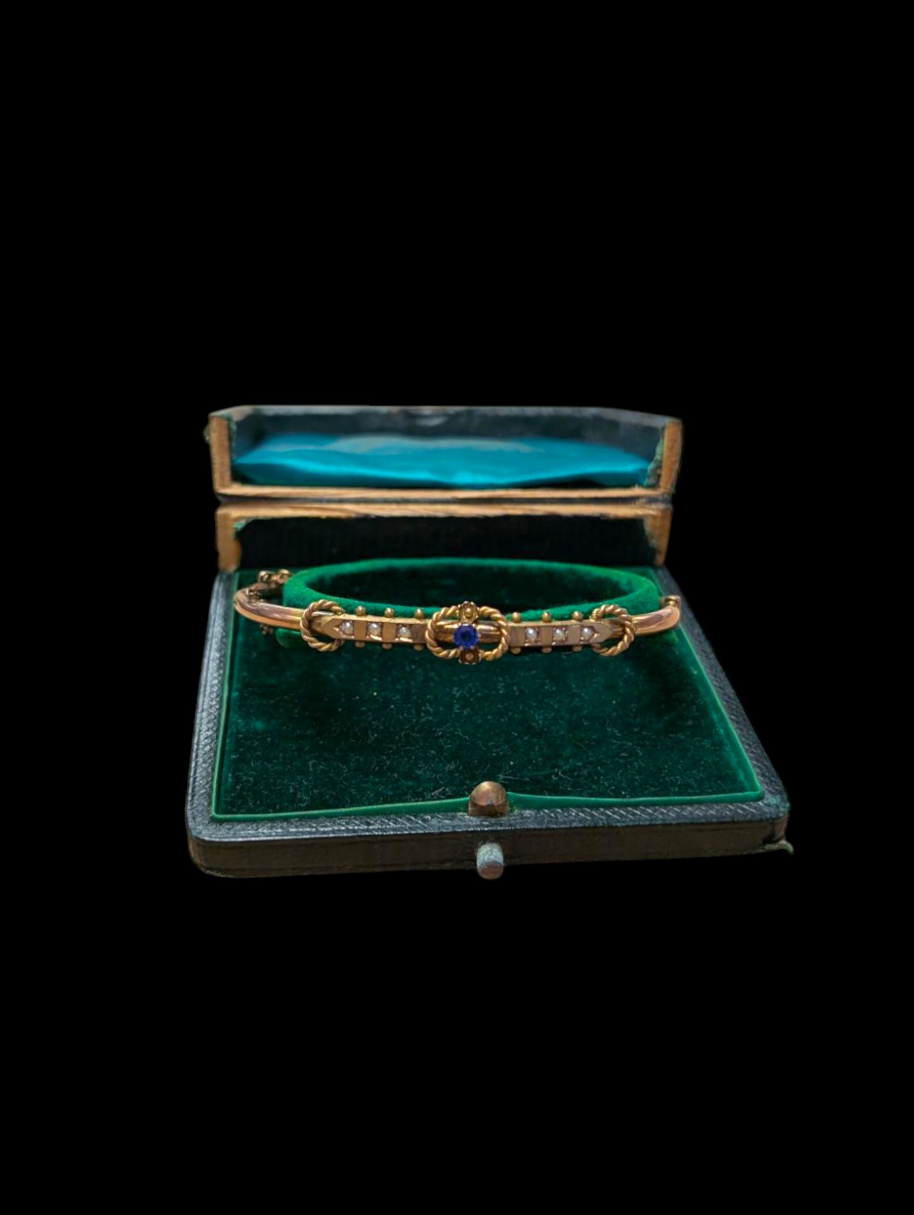 9ct gold stone set bangle, boxed