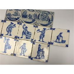 18th/19th century Delft blue and white tiles, comprising set of eight decorated with figures of workmen, and a set of three decorated with central circular panels depicting religious scenes, each approximately H13cm W13cm 