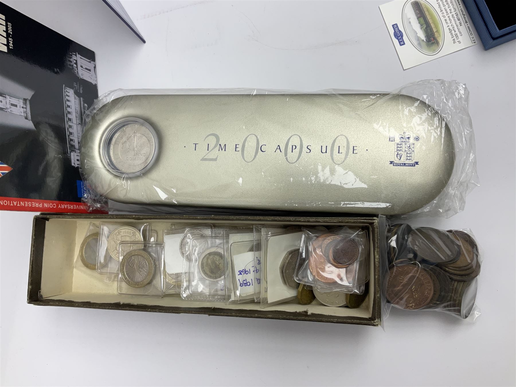 Commemorative and other coinage, including various Queen Elizabeth II 'London 2012 sports collection' fifty pence coins on cards, commemorative crowns, Millennium 2000 'Time Capsule' coin set, channel islands old round one pound coins, part sets etc