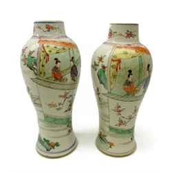  Pair 19th century Chinese Wucai baluster vases decorated with a continuous scene of figures in a garden landscape, H29cm   