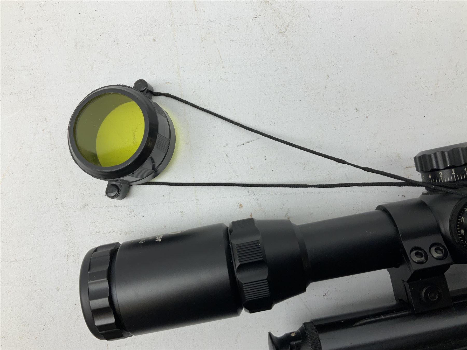 Stoegar .177 air rifle with break barrel action, 3 x 9 telescopic sight and fully integrated sound moderated barrel, no visible serial number, L109cm; in Stoeger lined gun sling