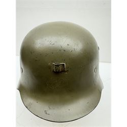WWII Spanish combat steel helmet model Z, with leather lining and canvas strap, interior D22cm 