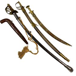 Three Indian swords, including Ceremonial Tulwar style sword with pierced decoration to brass scabbard, etc 