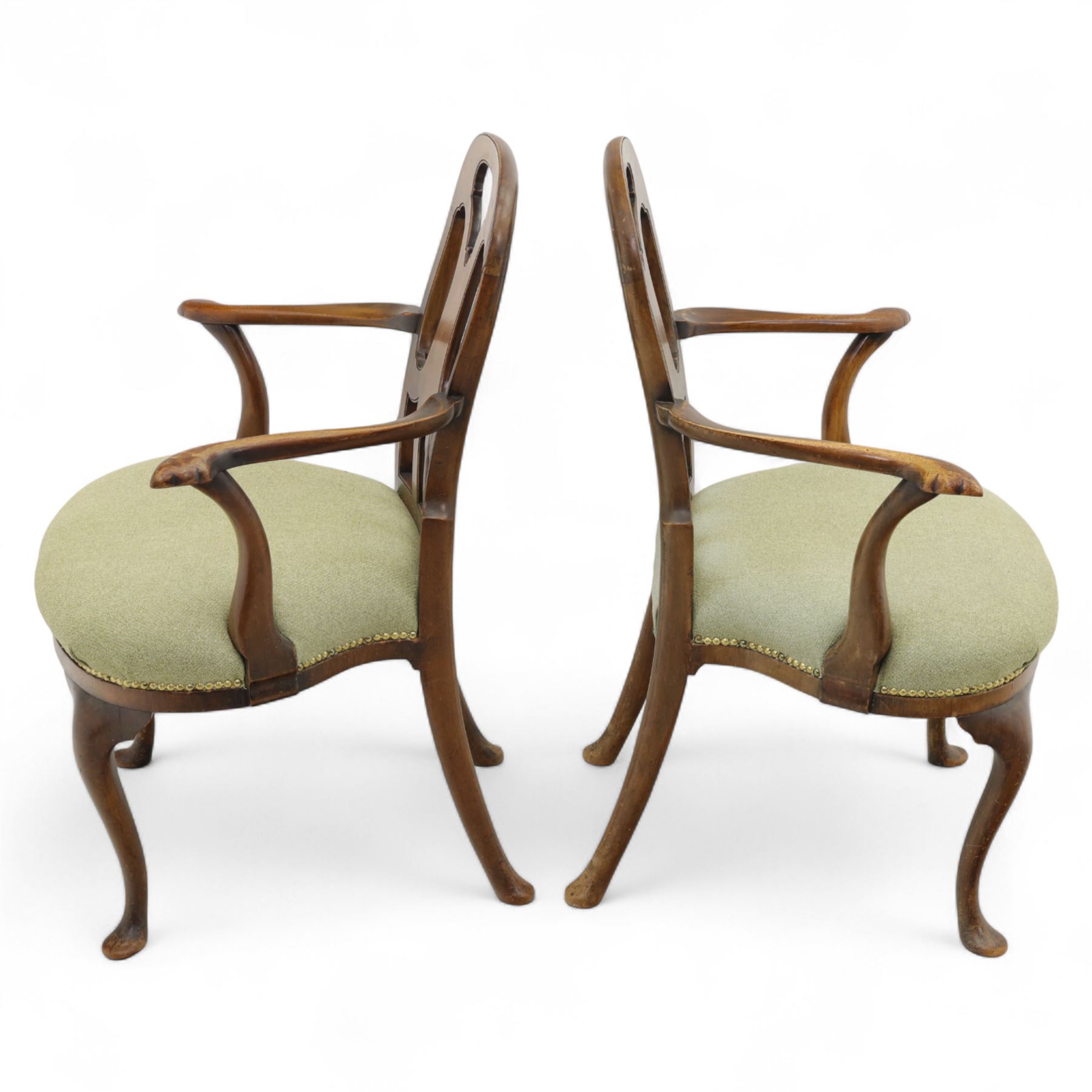 Pair of 1930s Queen Anne design walnut-framed open armchairs with vase-shaped pierced back splat and scroll end arms above a padded serpentine seat, raised on cabriole legs with pad feet