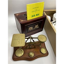Collection of items including brass postal scales with postal rates displayed, Mah Jong set in wooden box, cast metal cook book holder, a selection of glassware, two decanters etc, two boxes. 