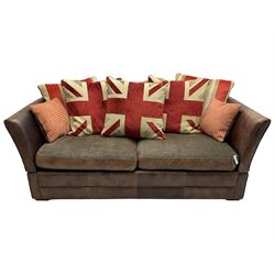 Large Knole design three-seat sofa upholstered in brown leather with scatter cushions upholstered in contrasting striped and Union Jack patterned fabric, on block feet (W210cm, H100cm, D102cm); together with matching rectangular footstool (135cm x 75cm, H45cm)