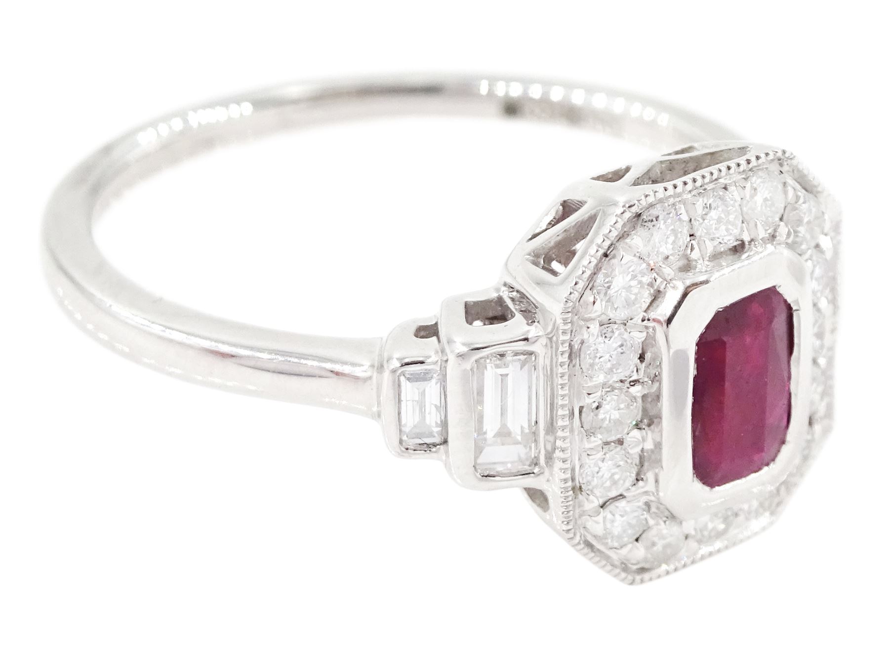 Platinum ruby and diamond ring, single octagonal cut ruby of approx 0.60 carat, with milgrain set round brilliant cut diamond surround and baguette cut diamond shoulders, hallmarked, total diamond weight approx 0.45 carat