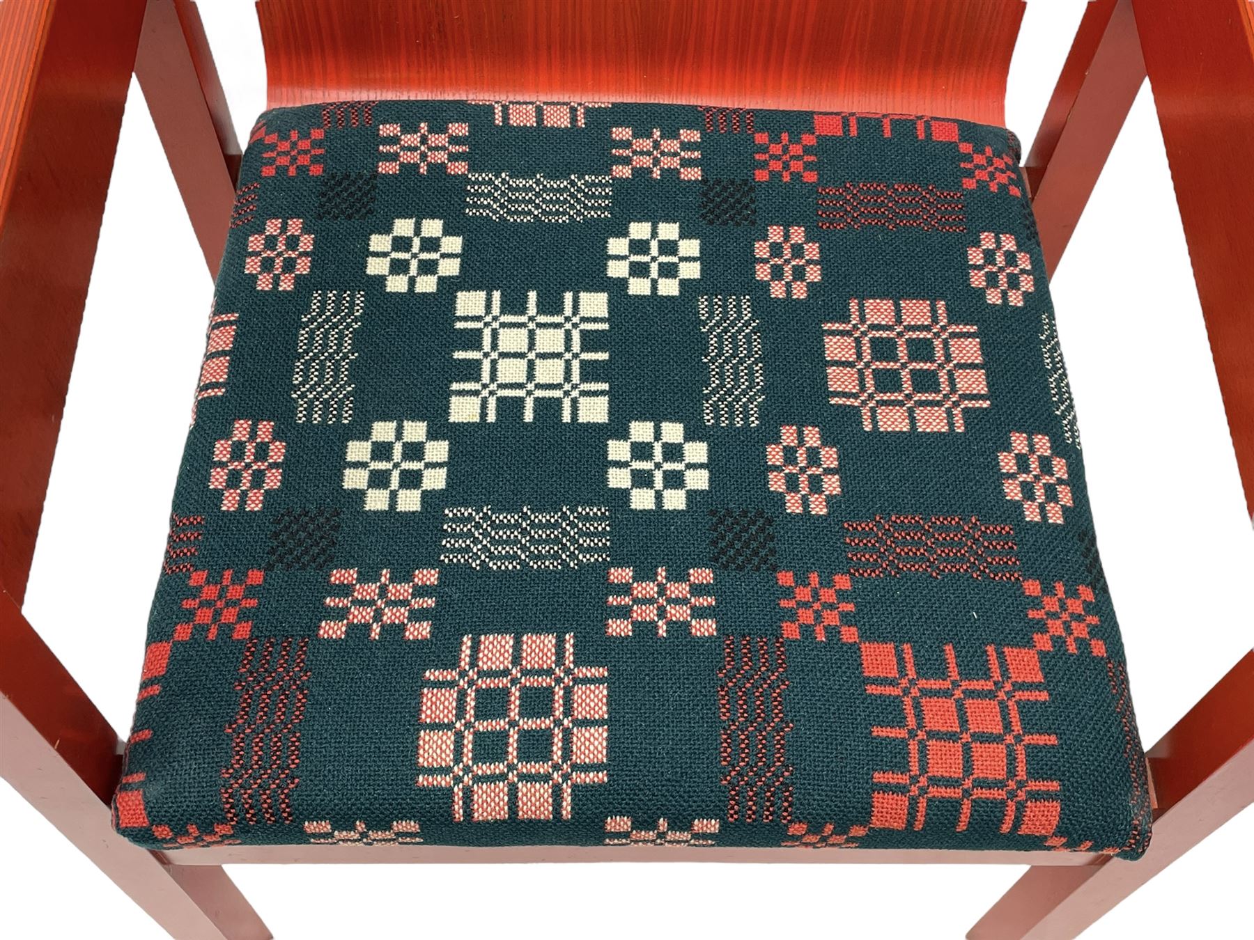 Prince Charles Investiture Chair - designed by Lord Snowdon, manufactured by Remploy, 1969, red finish and decorated with the Prince of Wales's feathers and moto 'Ich Dien' in gilt, later upholstered seat in 1950s design Welsh blanket weave fabric 