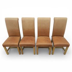 Modern large oak plank top dining table and twelve brown leather high back chairs, table of rustic construction five solid planks with exposed supports, the chairs in brown leather hide with ten standard height and a pair of taller chairs for the foot and head of the table