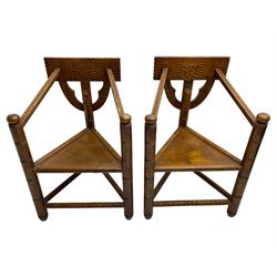 Pair of 18th century design oak turner chairs, the rectangular back incised with geometric decoration, triangular panelled seat, on turned supports