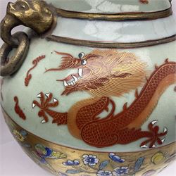 Pair of early 20th century Chinese vases decorated with dragons chasing a flaming pearl, with a gilt border of butterflies and floral sprigs, with Elephant head handles, H44cm 