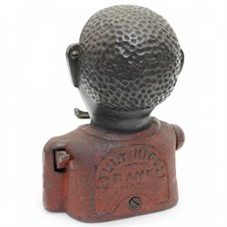 American painted cast iron money bank 'William Tell', the base marked 'Patented June 1896' L26cm and a 'Jolly Nigger' money bank (2)