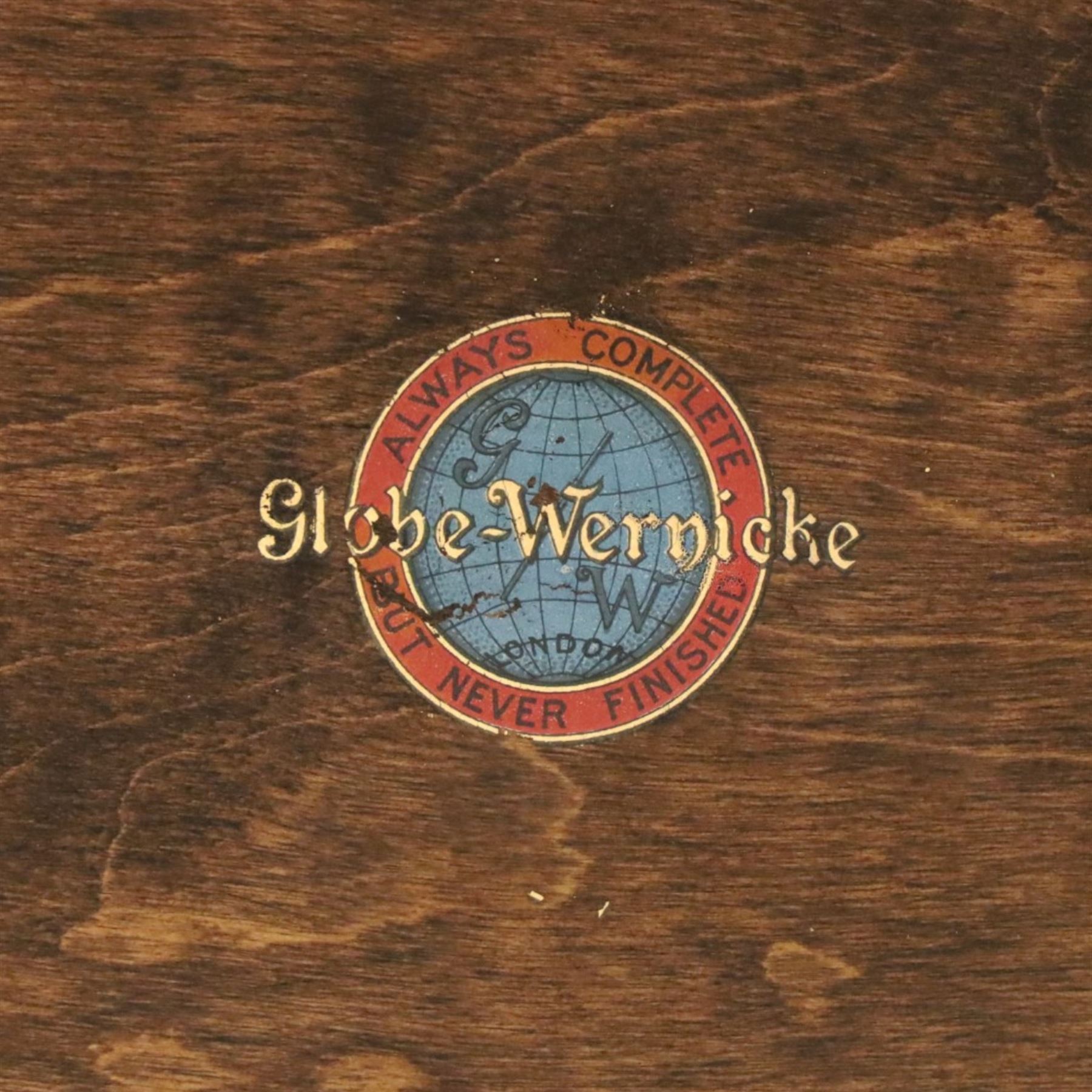 Globe Wernicke - oak four tier barrister bookcase, with leaded glazed fronts, raised on square supports
