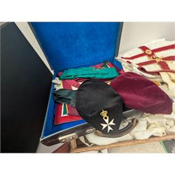 Collection of Masonic jewels and regalia, including robes, sashes, gloves, medallions, etc, in a number of briefcases and boxes