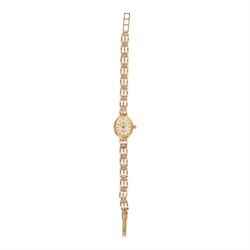 Sovereign ladies 9ct gold quartz watch, on integral 9ct gold bracelet, hallmarked, with ad...