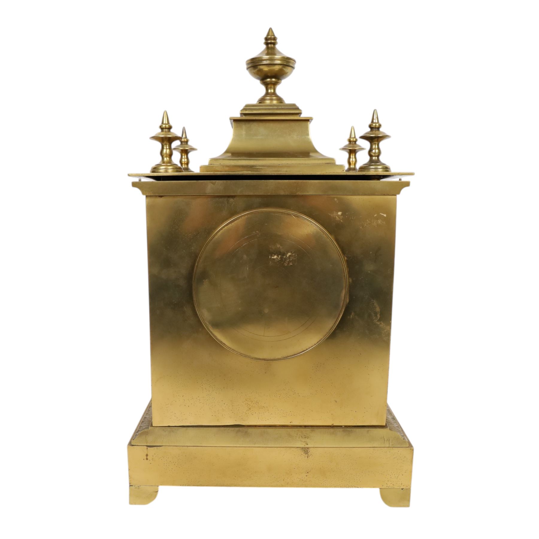 French gilt-bronze and porcelain mantel clock, architectural case surmounted by a stepped pediment with central urn finial and four subsidiary finials above two fluted Corinthian-style pilasters, the entire front inset with shaped porcelain panel incorporating a circular dial and numerals decorated with birds among flowering branches and two winding apertures and pierced brass hands, above a leaf and scroll cast frieze, raised on bracket feet, with an eight-day movement stamped 'AD MOUGIN Deux Medailles' striking the hours and half-hours on a coiled gong, with pendulum, circa 1900