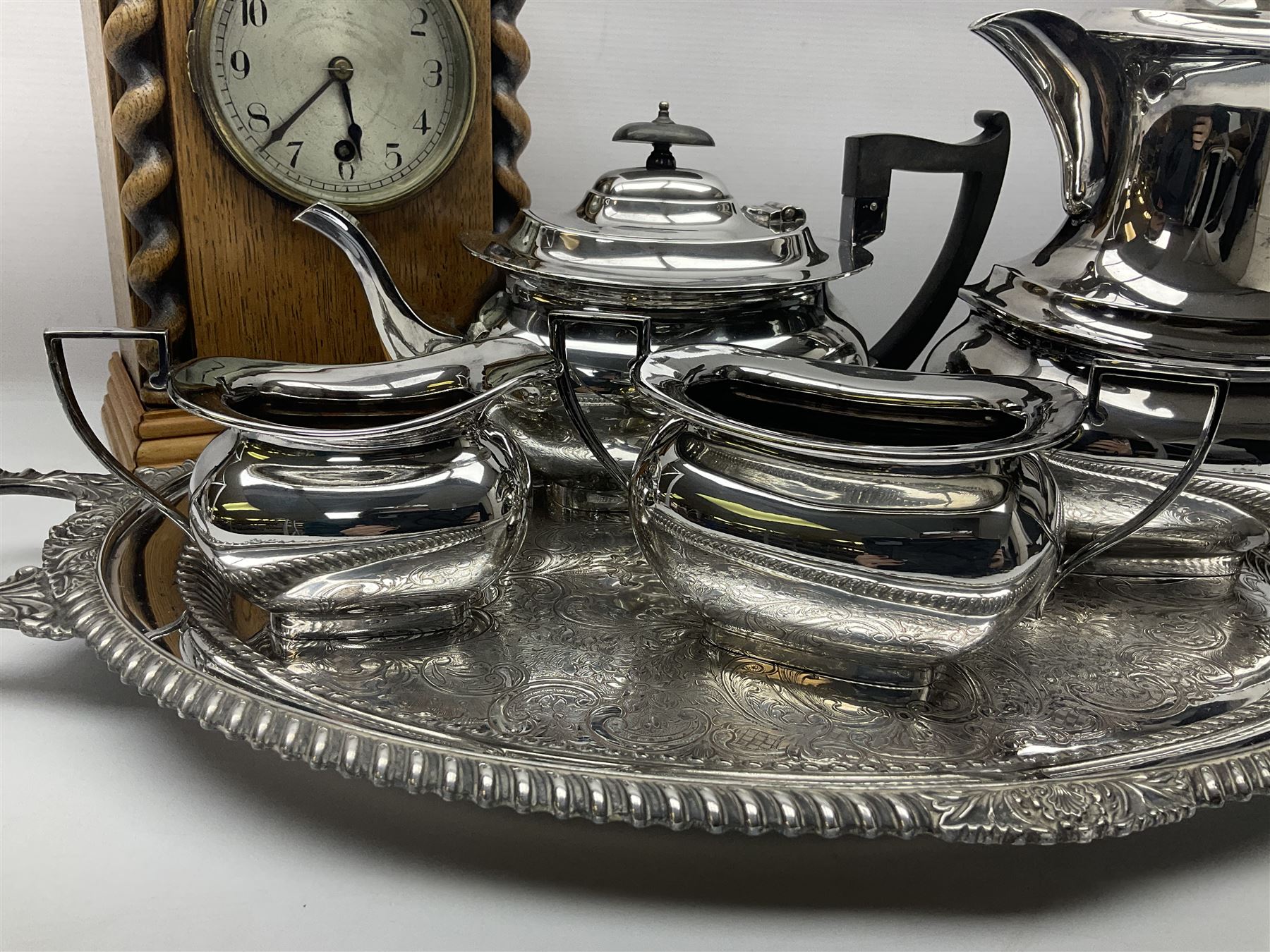 Walker and Hall silver plated tea set, comprising coffee pot, teapot, milk jug and sucrier, together with silver plated tray and a wooden clock with barley twist decoration, clock H28cm