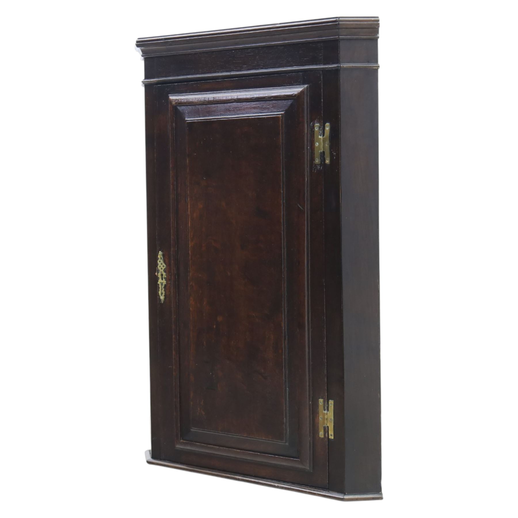George III country oak corner cupboard, enclosed by single cushion panelled door, brass H hinges