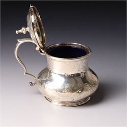 Victorian silver baluster mustard pot with engraved decoration London 1844, pair of silver oval salts and matching mustard  Birmingham 1918 and a circular mustard pot