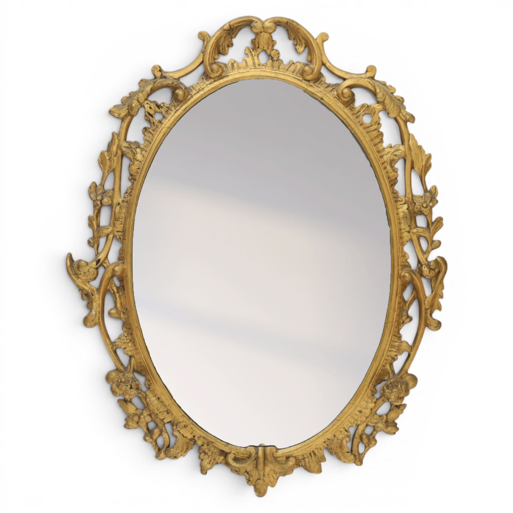 Rococo design gilt framed oval wall mirror, pierced frame with foliate design 