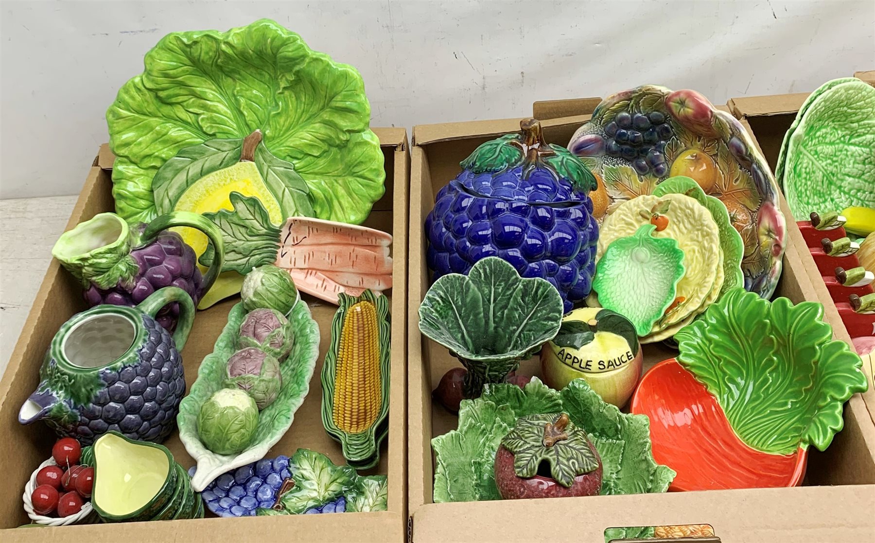 A large collection of various fruit and veg modelled and decorated