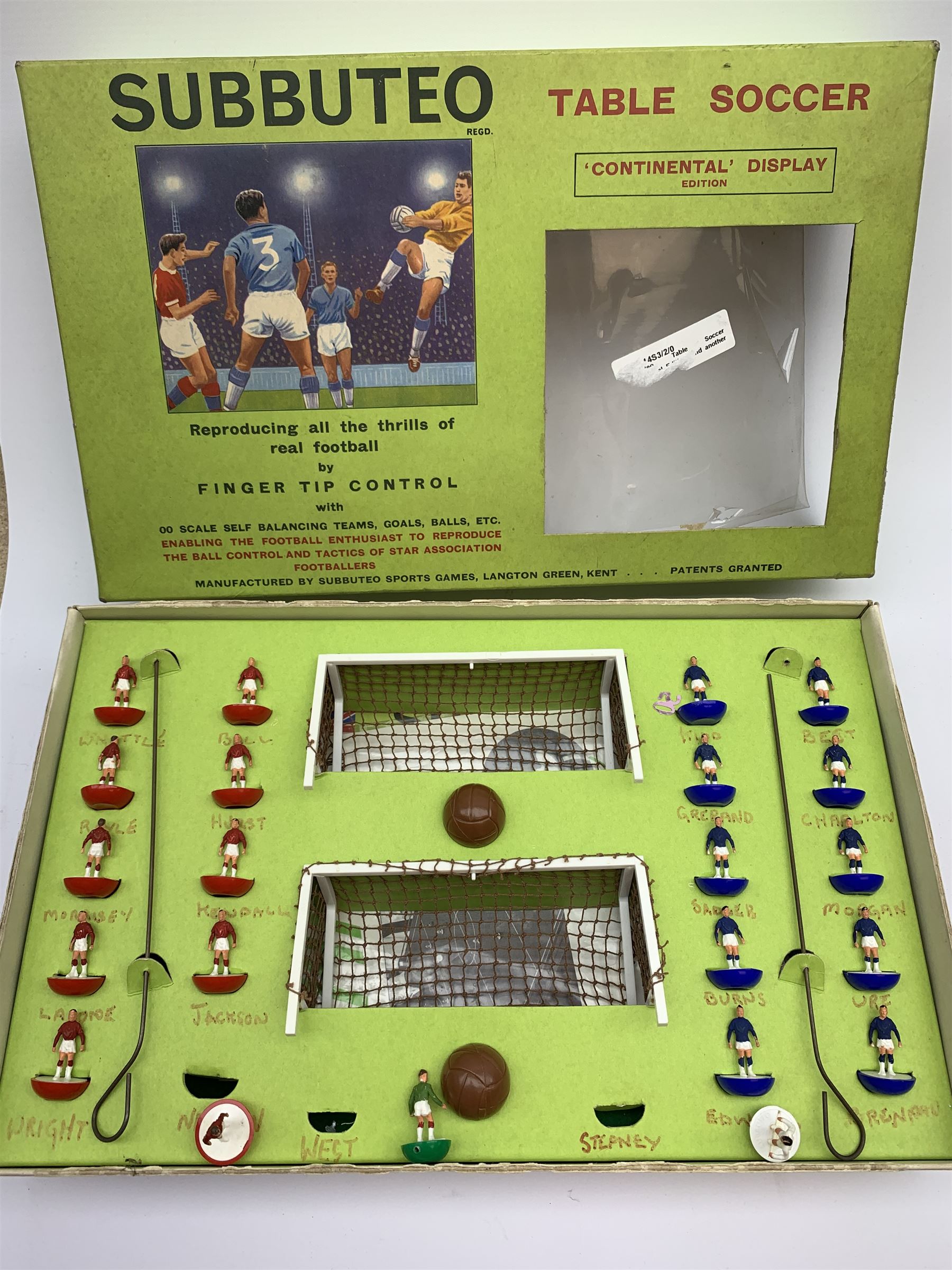 Subbuteo table soccer game with two teams, goals, balls, playing