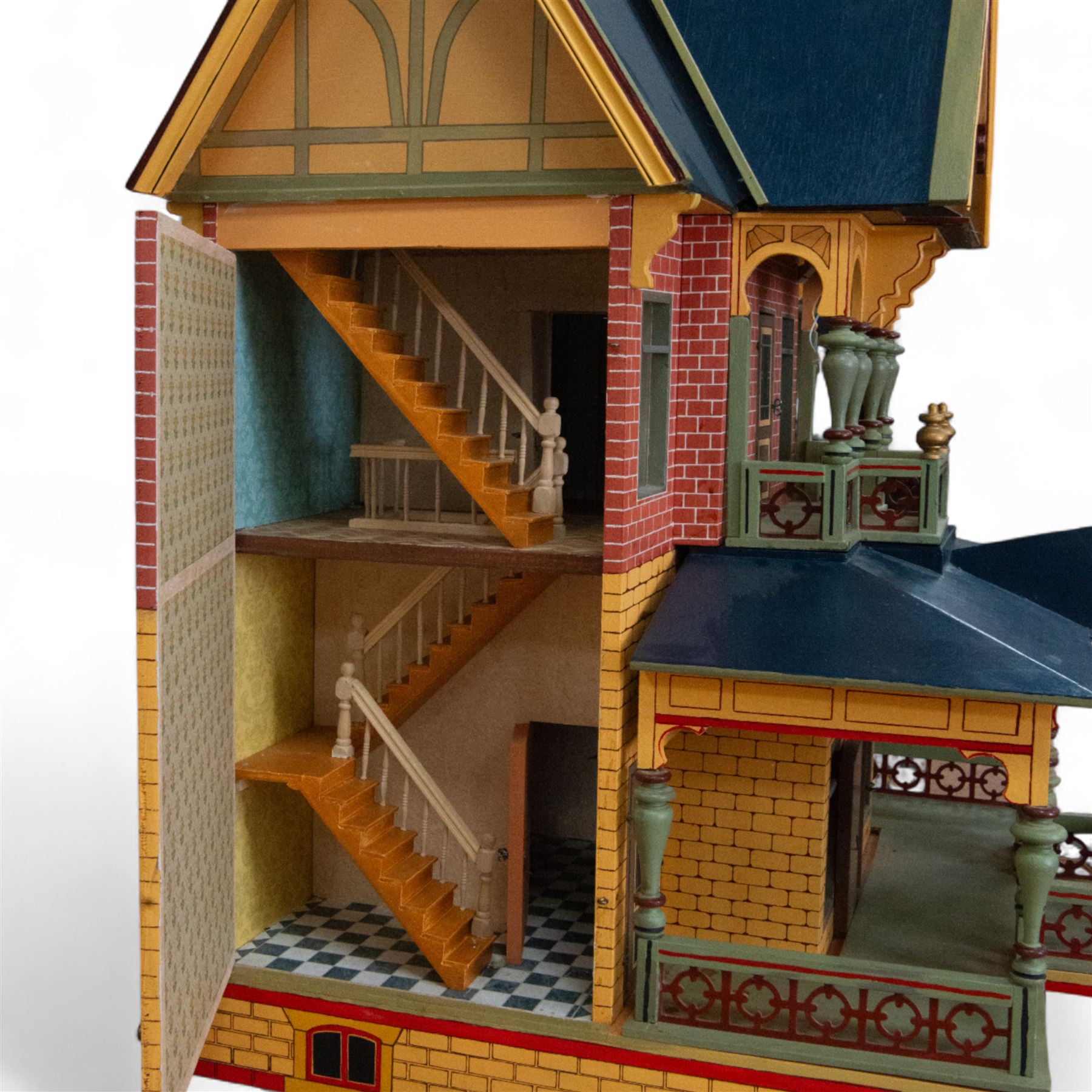 Moritz Gottschalk three storey wooden dolls house model 3589, with two side openings, with blue roof, painted exterior and wallpapered and painted interior, similar example featured in 'The Genius of Moritz Gottschalk' book, page 57, including chimney H100cm