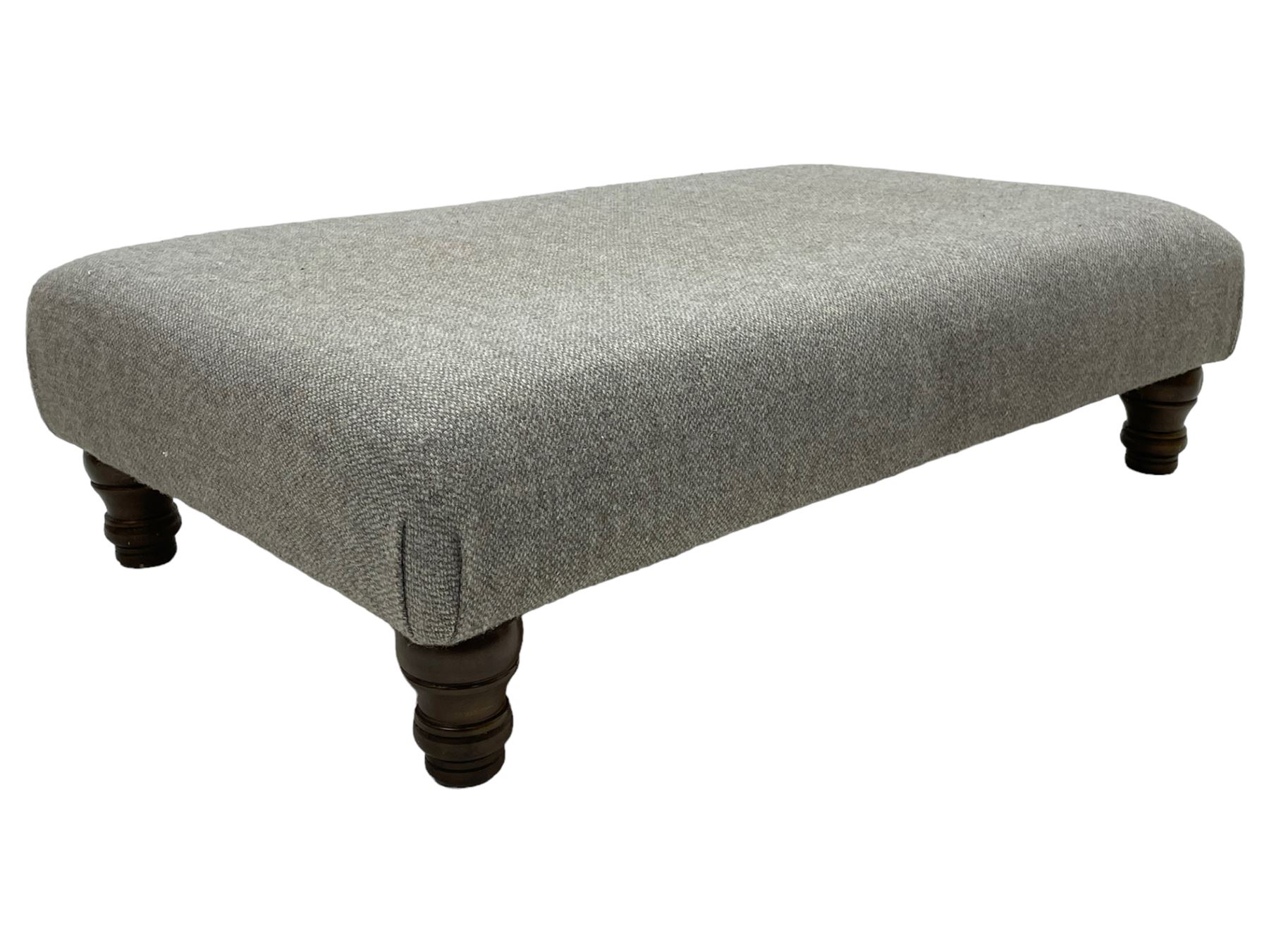 Interiors at Nine to Eleven - traditional rectangular footstool, the padded seat upholstered in neutral grey 'Harris Tweed' fabric, raised on turned feet