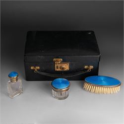 1920s silver mounted blue guilloche enamel travelling dressing table set, comprising hairbrush, comb, bottle and jar, hallmarked RWF Ltd, Birmingham 1927, contained withing tooled leather fitted case with bevelled mirror to interior