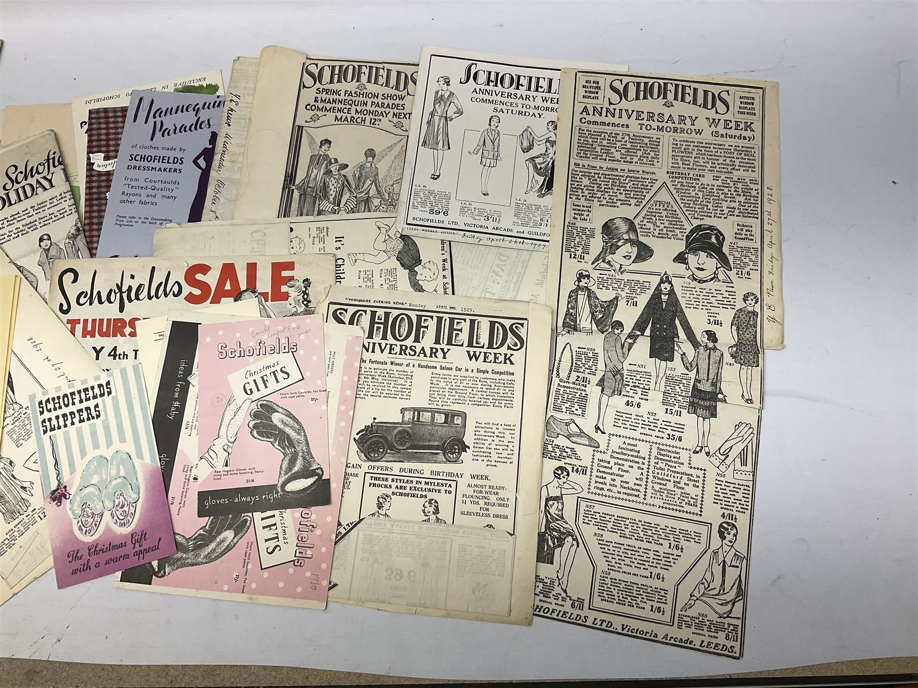 Quantity of paper ephemera relating to Schofields Department Store, The Headrow, Leeds, 1920s - 1950s, including Romance of Schofields 1922, Golden Jubilee Booklet 1951, various catalogues and promotional booklets and leaflets, Christmas offers, greeting cards, marketing and advertising items, menus etc