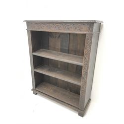 Victorian heavily carved oak bookcase, rectangular top with carved and moulded edge, flower head lunette frieze, three adjustable shelves, W92cm, H114cm, D32