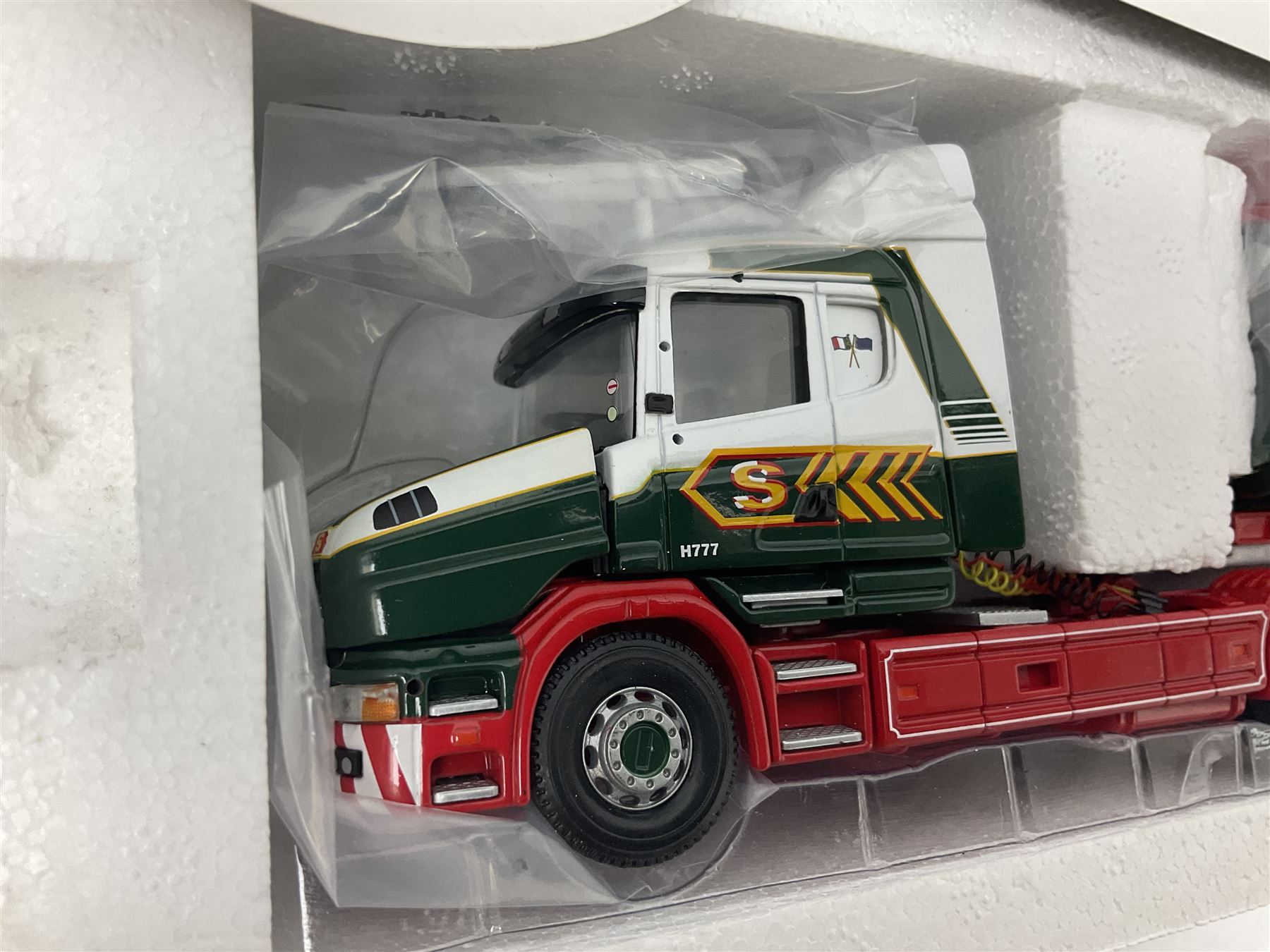 Corgi Eddie Stobart - three lorries; limited edition CC12802 Scania T-Cab Bulk Tipper; limited edition CC13201 DAF XF Super Space Cab Curtainside; and CC13401 MAN TGA Curtainside; all boxed (3)