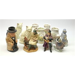 Two Royal Doulton figurines, The Coachman HN2282, and Lunchtime HN2484, together with a Royal Doulton toby jug modelled as Winston Churchill, two Lladro figurines, four Royal Doulton Brambly Hedge jugs, Spring, Summer, Autumn, and Winter, and a pair of composite figures of cats. 