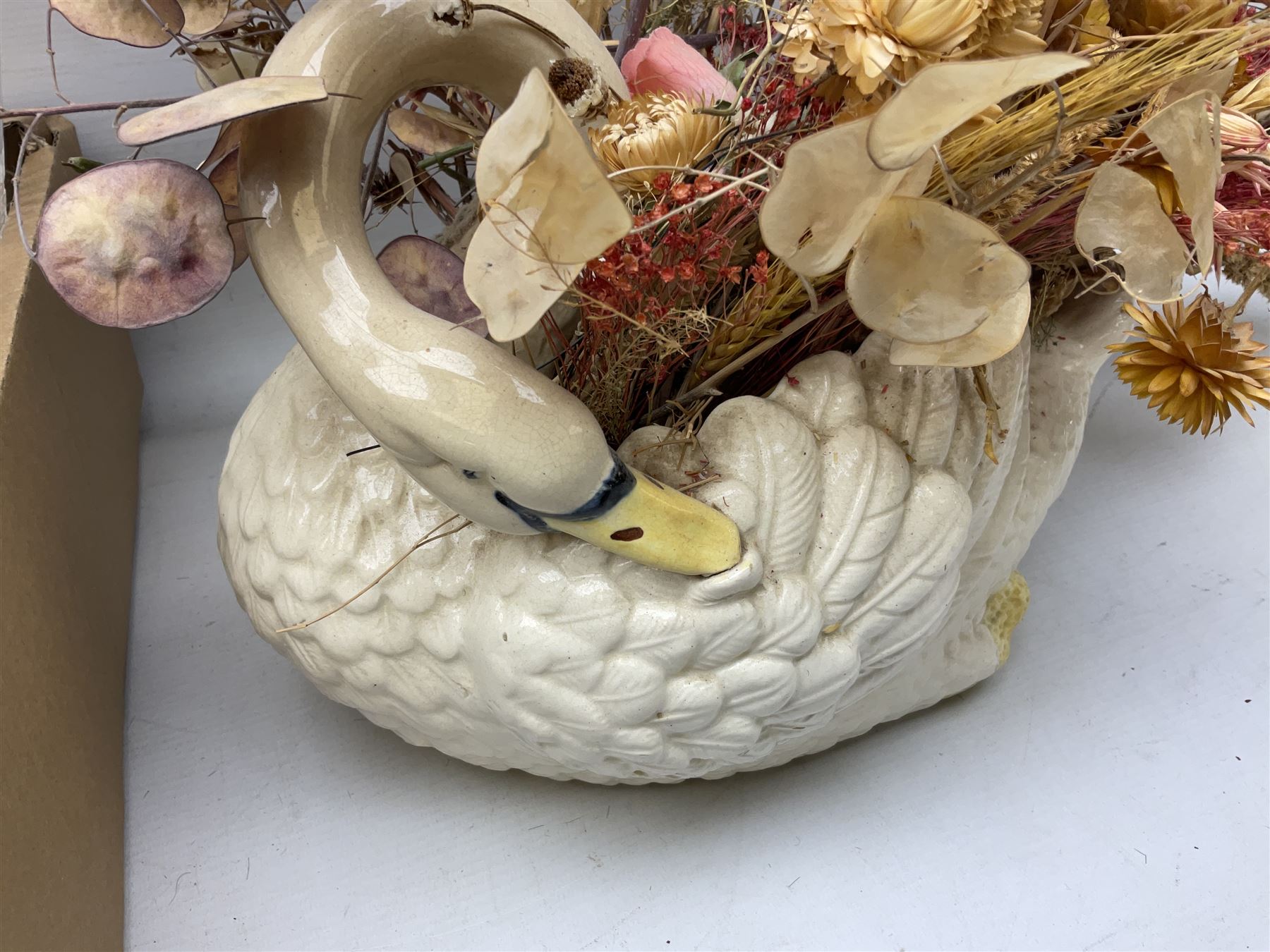 Large Swan pottery vase with a bouquet of dry flowers together with  oblong crystal bowl, Stuart crystal vase, Poole pottery cups and plate etc
