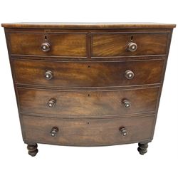 Victorian mahogany bow-front chest, two short over three long cock-beaded drawers with turned handles, on turned feet