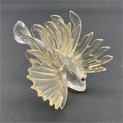 Swarovski Crystal sea creatures, comprising lion fish and dolphin, both with coloured elements, together with two seahorses, two small fish groups, butterfly fish, longnose butterfly fish and six coloured shells, tallest H8.5cm