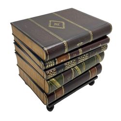 Maitland-Smith - four drawer chest in the form of a stack of leather-bound books, the top drawer with metal label inscribed 'Maitland-Smith', on turned feet