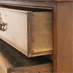 Traditional design walnut inlaid chest, with figured top with circular inlay and crossbanded top with moulded edge, figured drawers with cockbeaded edges and brass handles, raised on bracket feet