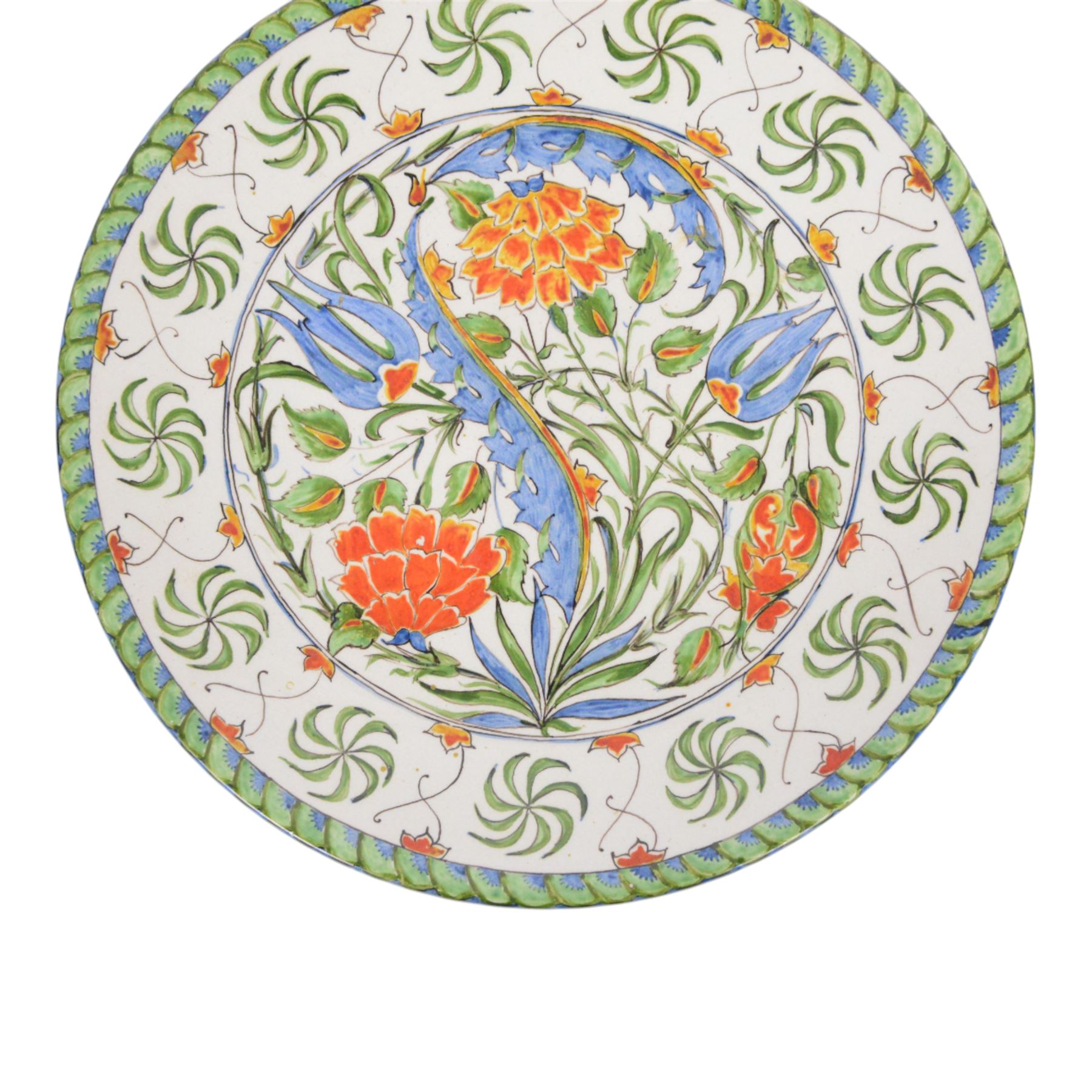 Iznik stlye plate, tin-glazed earthenware decorated with flowers and foliage, with impressed makers mark beneath, D25cm